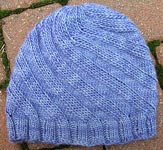 handknit swirly hat; Malabrigo Silky Merino Yarn color 414 london sky