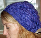 knitted slouchy hat; Malabrigo Silky Merino Yarn, color 30 purple mystery