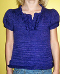 Child's pullover sweater with puff sleeves; Malabrigo Silky Merino Yarn, color 30 purple mystery