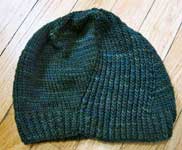 handknit swirly ribbed cap, hat; Malabrigo Worsted Merino Yarn color VAA #51