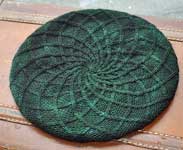 handknit cap,  tam, beret; Malabrigo Worsted Merino Yarn color VAA #51