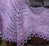 Lace shawl; Malabrigo Worsted Merino Yarn, color orchid 34