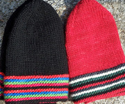 Malabrigo Worsted Merino Yarn, color ravelry red #611, hats