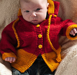 Malabrigo Worsted Merino Yarn, color ravelry red #611, baby sweater