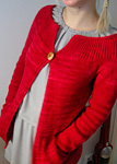 Malabrigo Worsted Merino Yarn, color ravelry red #611, cardigan sweater