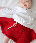 Malabrigo Worsted Merino Yarn, color ravelry red #611, baby skirt