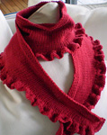 Malabrigo Worsted Merino Yarn, color ravelry red #611, ruffled scarf