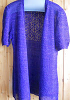 Malabrigo Silkpaca Yarn color violetas knit short sleeved open front cardigan