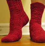Malabrigo Sock Yarn color ravelry red knit cabled socks