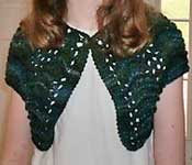 handknit lacey shrug; Malabrigo Worsted Merino Yarn color VAA #51