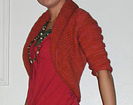 textured circle shrug free knitting pattern; Malbrigo Worsted Merino, color 194 cinnabar