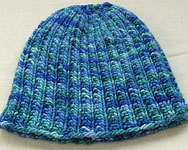 Malabrigo Worsted Merino Yarn, color emerald blue #137, hat