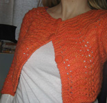 knitted cardigan; Malabrigo Worsted Yarn, color #152 tiger lily