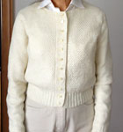 Hand-knit cardigan sweater with Malabrigo Merino Sock Yarn color natural